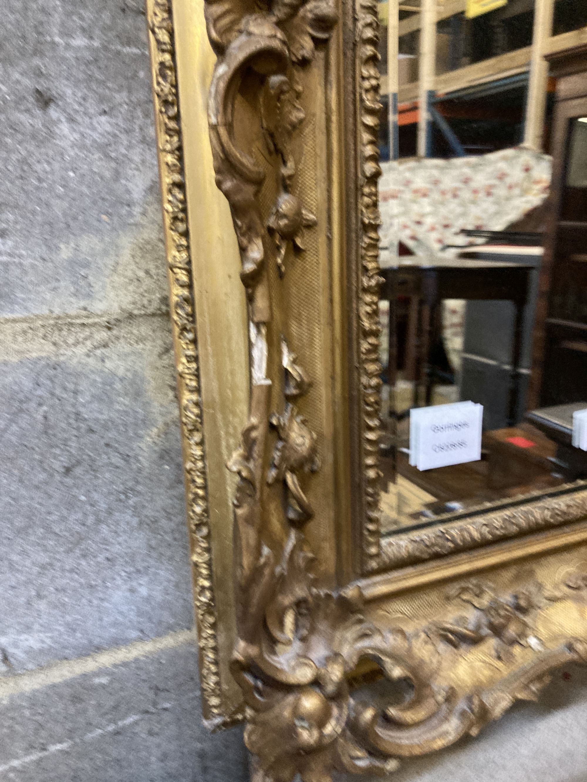 A Victorian rectangular giltwood and gesso frame (now as a wall mirror) width 53cm, height 69cm